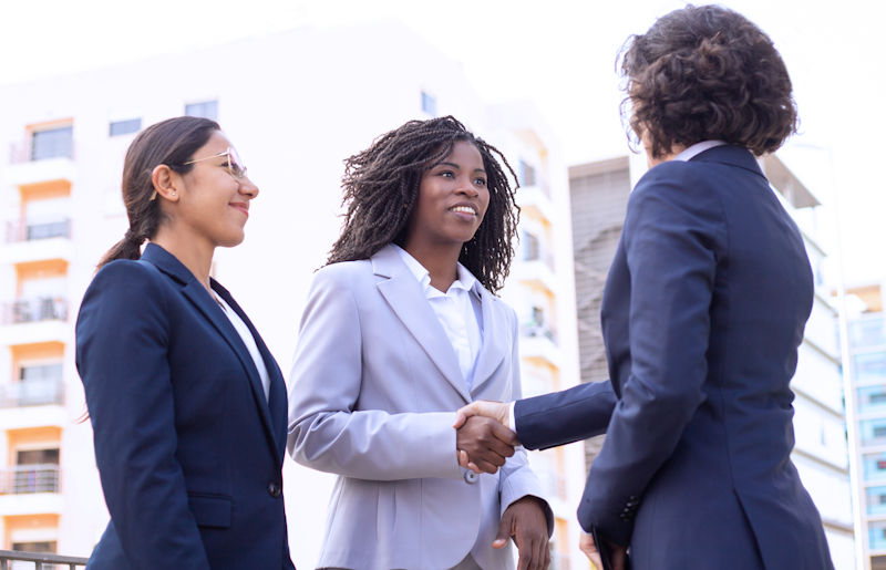 woman shaking hands